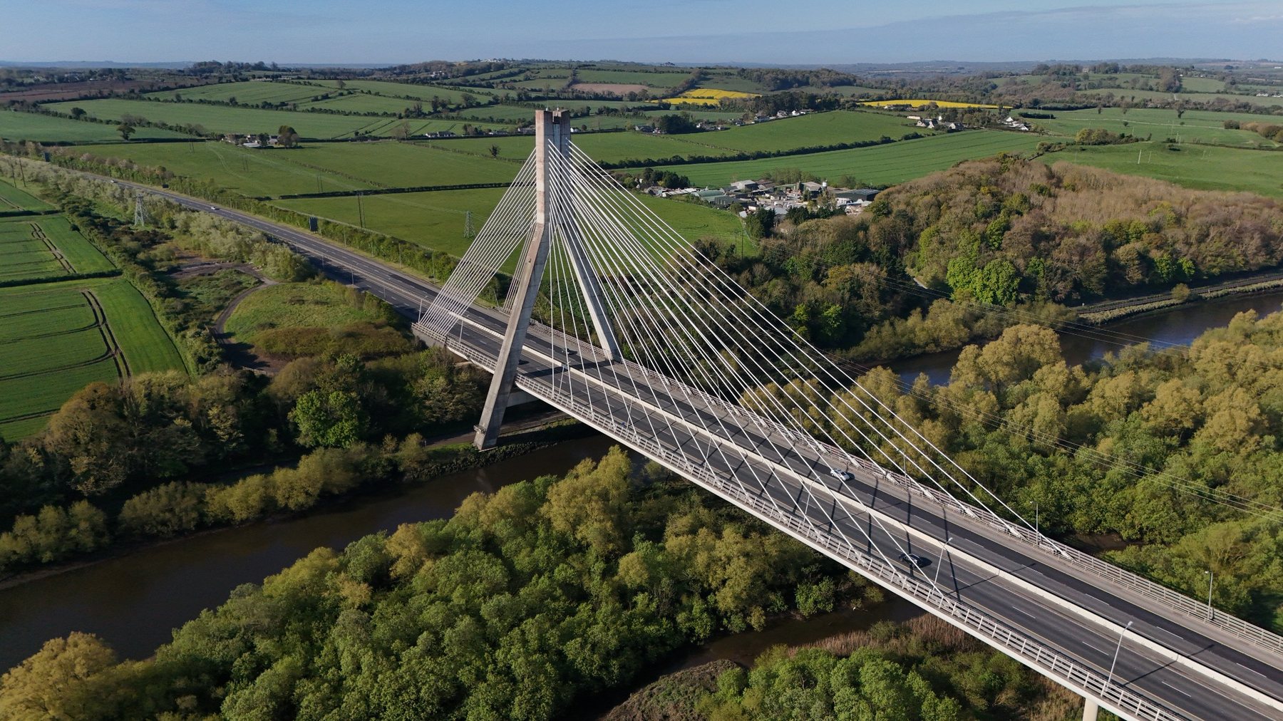 Aerial photograph of a cable-stayed bridge crossing a river