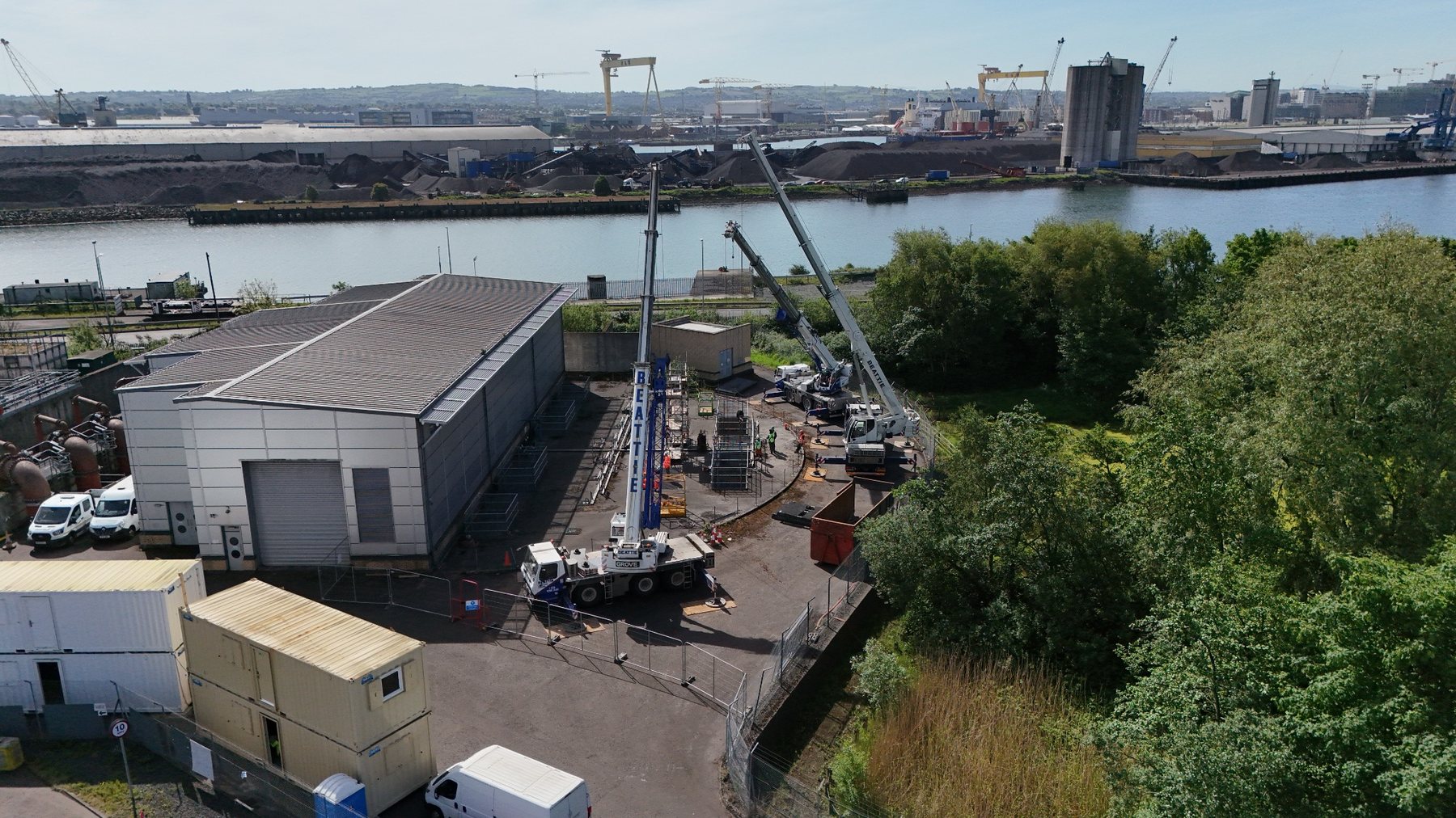 Aerial photograph of industrial water infrastructure beside a harbour
